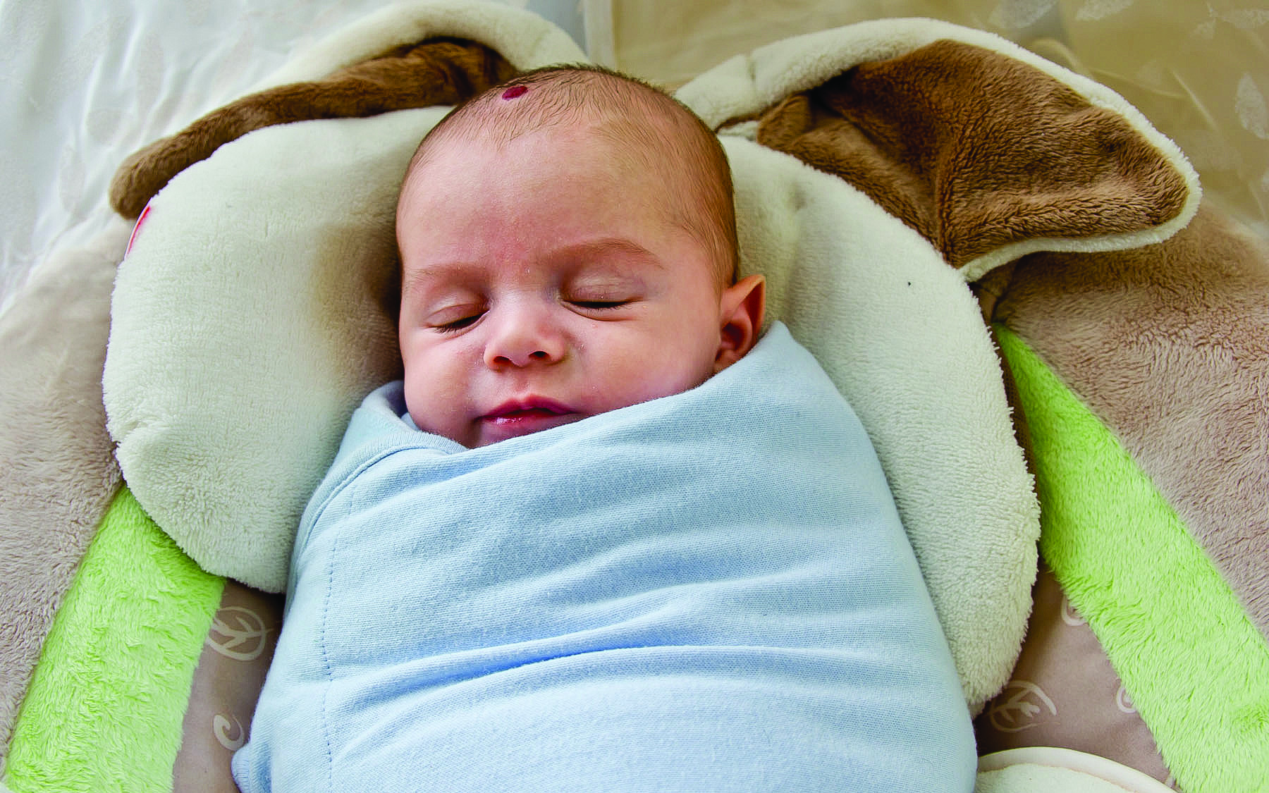 Swaddling can help babies adjust to their surroundings - The Sunday ...