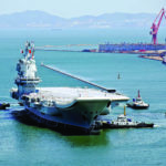 China’s first domestically developed aircraft carrier is seen at a port in Dalian after completing its first sea trials