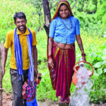 Dharam Singh and Somibai show their water connection