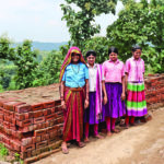 USHA1 Somibai and daughters with bricks they have made