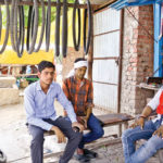 Ajit Yadav (left) and his friends at a shop in Ghazipir.