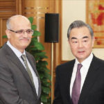 Foreign Secretary Vijay Keshav Gokhale shakes hands with Chinese State Councilor and Foreign Minister Wang Yi, in Beijing, China, on 22 April. REUTERS