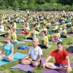 Yoga enthusiasts at the iconic Washington Monument in Washington DC on 16 June.