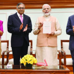 New Delhi: Prime Minister Narendra Modi unveils the book “Bridgital Nation” in New Delhi on Oct 21, 2019. Also seen Tata Sons Chairman Emeritus Ratan Tata and the book’s authors – Tata Sons Chairman Natarajan Chandrasekaran and Chief Economist and Head of