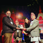 Amitabha Bagchi, winner of the DSC Prize 2019, receiving the trophy from Pradeep Gyawali, Minister of Foreign Affairs of Nepal copy