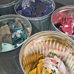 At FabScrap’s warehouse in Sunset Park, Brooklyn, textiles from fashion studios are sorted by material and color, on May 7, 2019. (John Taggart/The New York Times)