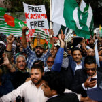 Demonstrators protest the scrapping of the special constitutional status in Kashmir by the Indian government, outside the Indian High Commission in London