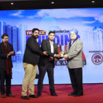 Mr. vishal Vaibhav, Head Marketing & Mr.Lalit,Ajnara India imited receiving the award for Best Upcoming Project of Raj Nagar Extension in Ghaziabad copy