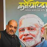 Man Mohan_Amit Shah releasing a book on PM Narendra Modi’s life copy