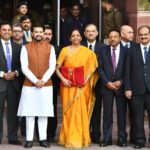 New Delhi: Union Finance and Corporate Affairs Minister Nirmala Sitharaman carrying budget papers wrapped in a red cloth, accompanied by Union MoS Finance and Corporate Affairs Anurag Thakur and other officials of the Finance Ministry, leaves for the Parliament to present the Union Budget 2020-2021, in New Delhi on Feb 1, 2020. (Photo: IANS)