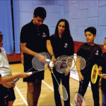 Indian national coach Pullela Gopichand interacts with budding badminton players at a training centre in Mumbai on December 19, 2019.