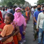 Amritsar: Migrant workers from Chhattisgarh queue up outside the Amritsar Railway Station as they arrive to board Shramik Special trains to return to their home state, during the fifth phase of the nationwide lockdown imposed to mitigate the spread of coronavirus, on June 2, 2020. (Photo: IANS)