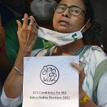 West Bengal Chief Minister Mamata Banerjee removing the facemask while announcing the list of TMC candidates