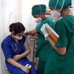 A healthcare worker gets the COVID-19 vaccine at Nair Hospital