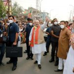 Union Home Minister Amit Shah shows victory sign