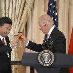 Chinese President Xi and U.S. Vice President Biden raise their glasses in a toast during a luncheon at the State Department, in Washington