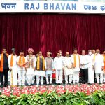 Karnataka Governor Thawar Chand Gehlot and Karnataka Chief Minister Basavaraj Bommai with newly inducted ministers during the swearing-in ceremony