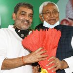 Bihar Chief Minister Nitish Kumar greeting RLSP president Upendra Kushwaha after he merged the party with JD(U),