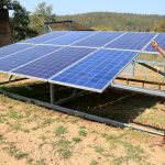 A villager shows the recently installed solar system by the Jharkhand govt