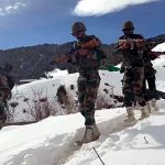 Army personnel patrolling in heavy snow along China border