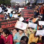 Kashmiri Pandit employees stage a protest demanding relocation of jobs