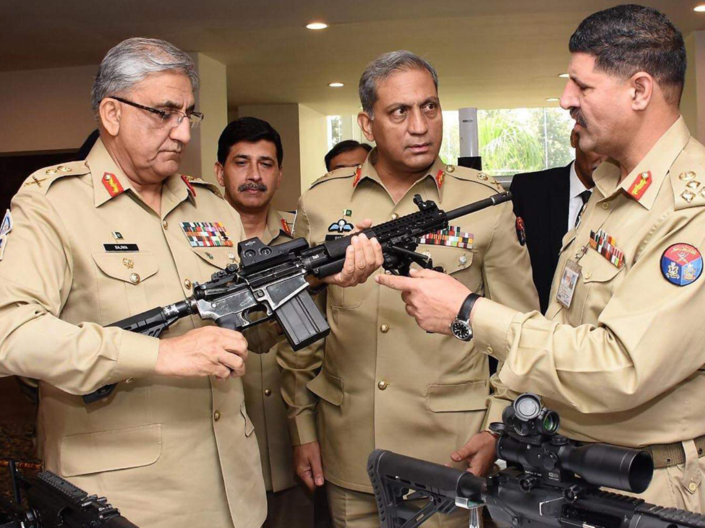 File picture of former Pakistan army chief QamarJaved Bajwa (holding the gun).