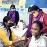 A health worker inoculates Measles and Rubella vaccine to a student during a state-wide MR vaccination drive in Kolkata