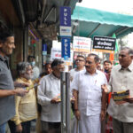 Virendra Sachdeva with Ramvir Singh Bidhuri and others during Jan Sampark Abhiyan demanding resignation of Arvind Kejriwal over the alleged liquor policy case