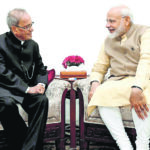 Prime Minister Narendra Modi greeting the former President of India Pranab Mukherjee