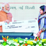 Prime Minister Narendra Modi distributes loans under the PM SVANidhi scheme