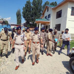 IGP Kashmir V.K. Birdi leaves after conducting a security and election review meeting ahead of J&K Assembly elections