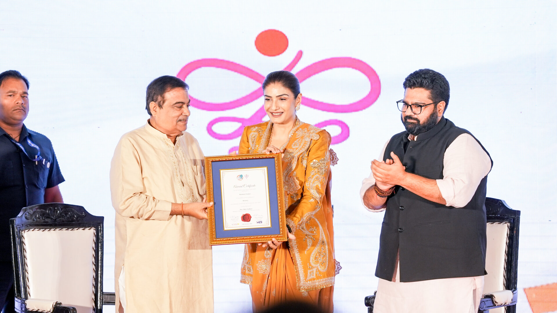 Union Minister Nitin Gadkari conferring the Shakti Award 2024 to Bollywood actress and Padma Shri recipient Raveena Tandon in the presence of Rajya Sabha MP Kartikeya Sharma.