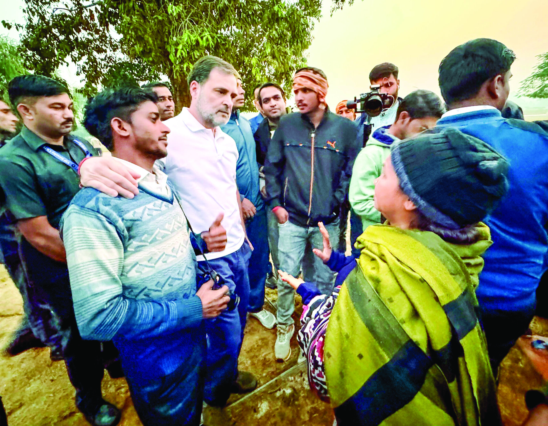 Leader of Opposition in Lok Sabha and Congress leader Rahul Gandhi meets with locals at India Gate to listen to their concerns about air pollution in the region, in New Delhi on Friday. ANI