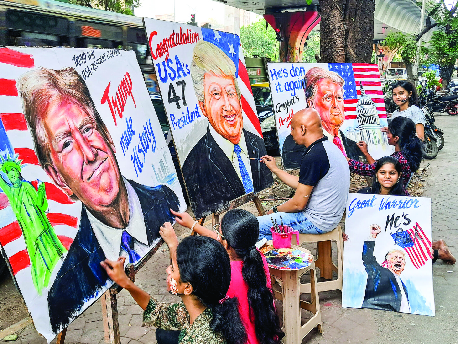 Representational photo: Artists draw portraits to congratulate Republican candidate Donald J. Trump on his victory in the US presidential election, in Mumbai on 6 November. ANI