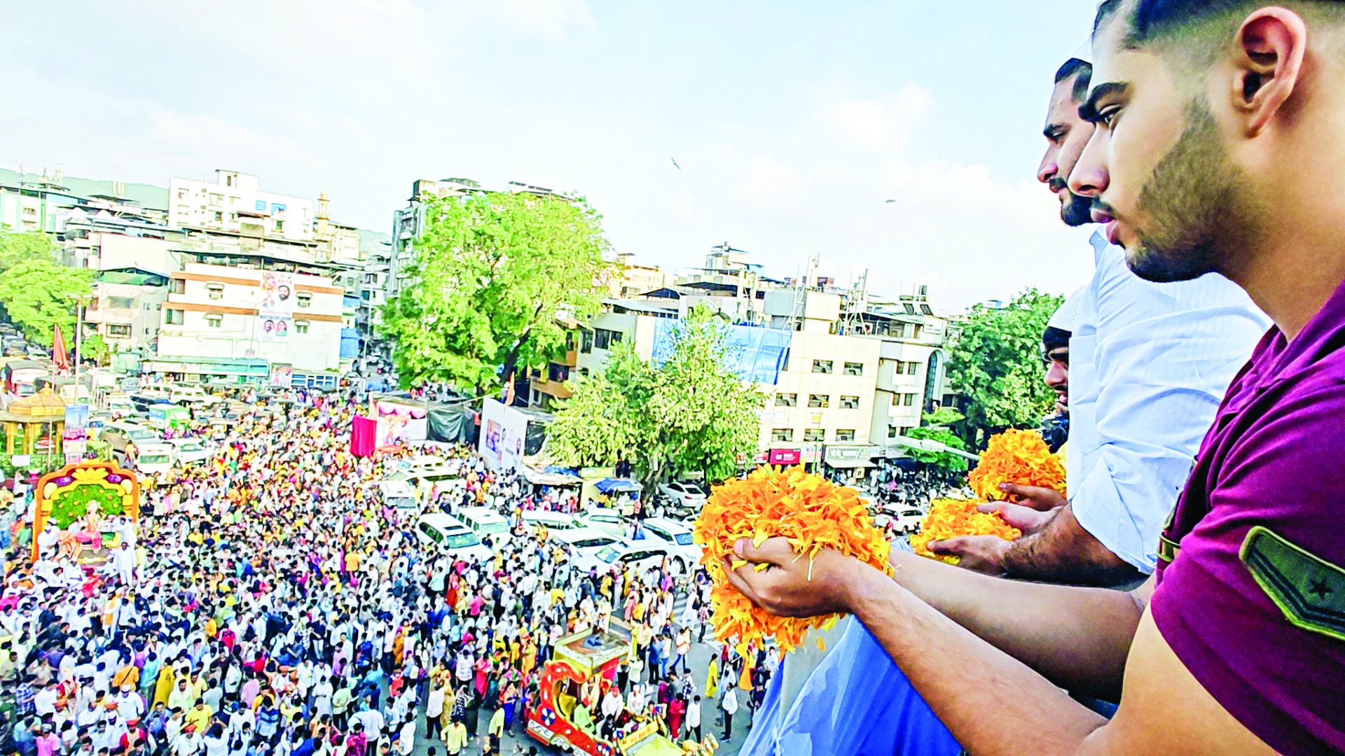 Representational photo: Muslim men shower flowers on the procession of Ambe Mata on the first day of the Navratri Festival, at Kalwa in Thane on 4 October. ANI