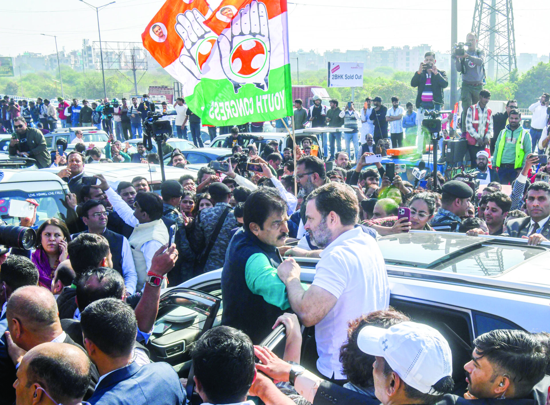 LoP in Lok Sabha Rahul Gandhi and party MP KC Venugopal in a conversation after being stopped by police at the Ghazipur border on their way to violence-hit Sambhal, in New Delhi on Wednesday. ANI