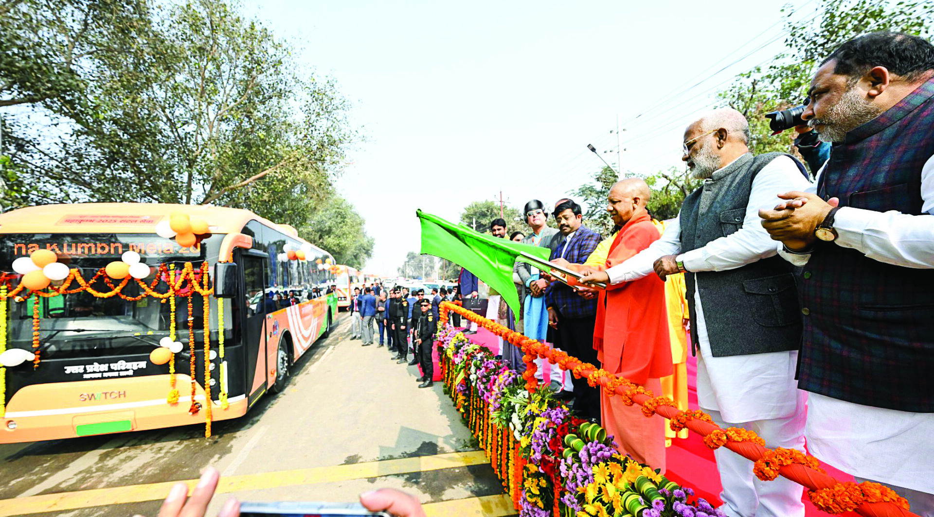 UP CM Adityanath flags off ‘Maha Kumbh Special Buses’ of UPSRTC, in Prayagraj on Friday. State Ministers Daya Shankar Singh and Swatantra Dev Singh are also present. ANI