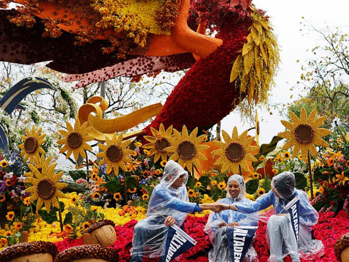 Students celebrate alongside their award-winning float. - Photo Gallery