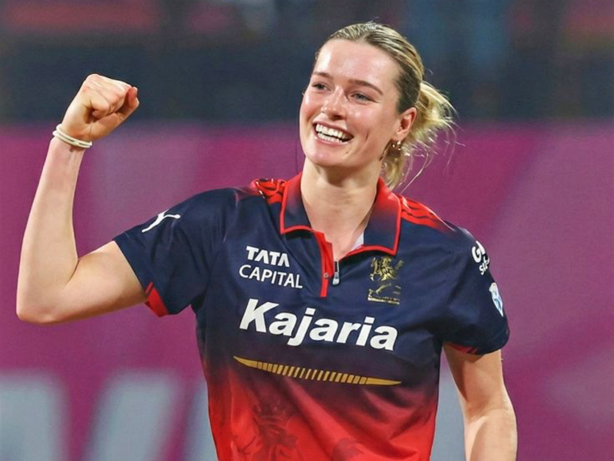 Lauren Bell in RCB colours during WPL - Photo Gallery
