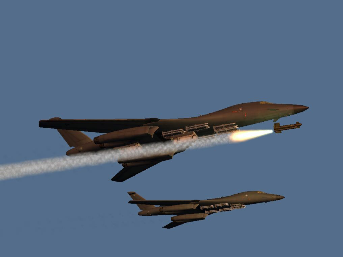 B-1B releasing bombs over target area in exercise. - Photo Gallery