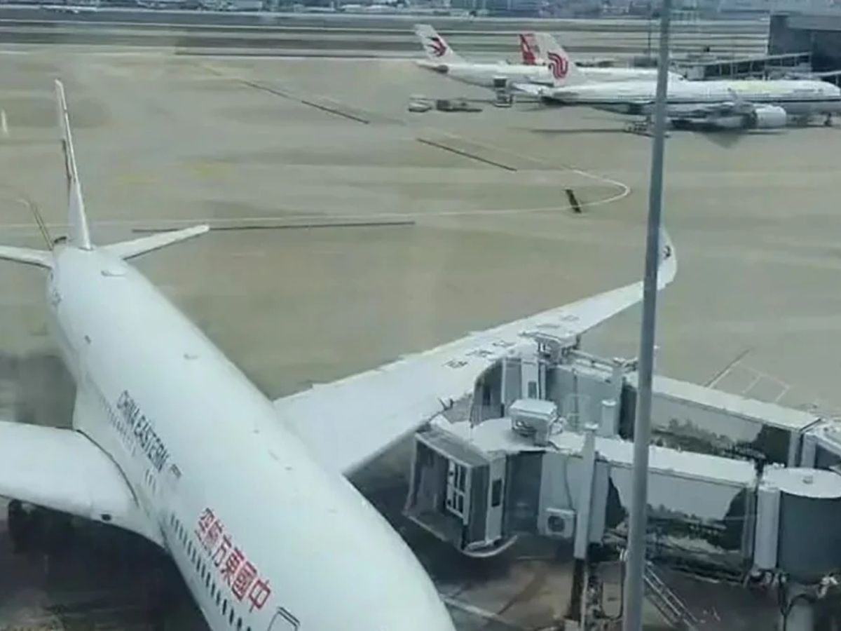 China Eastern flight collides with jet bridge